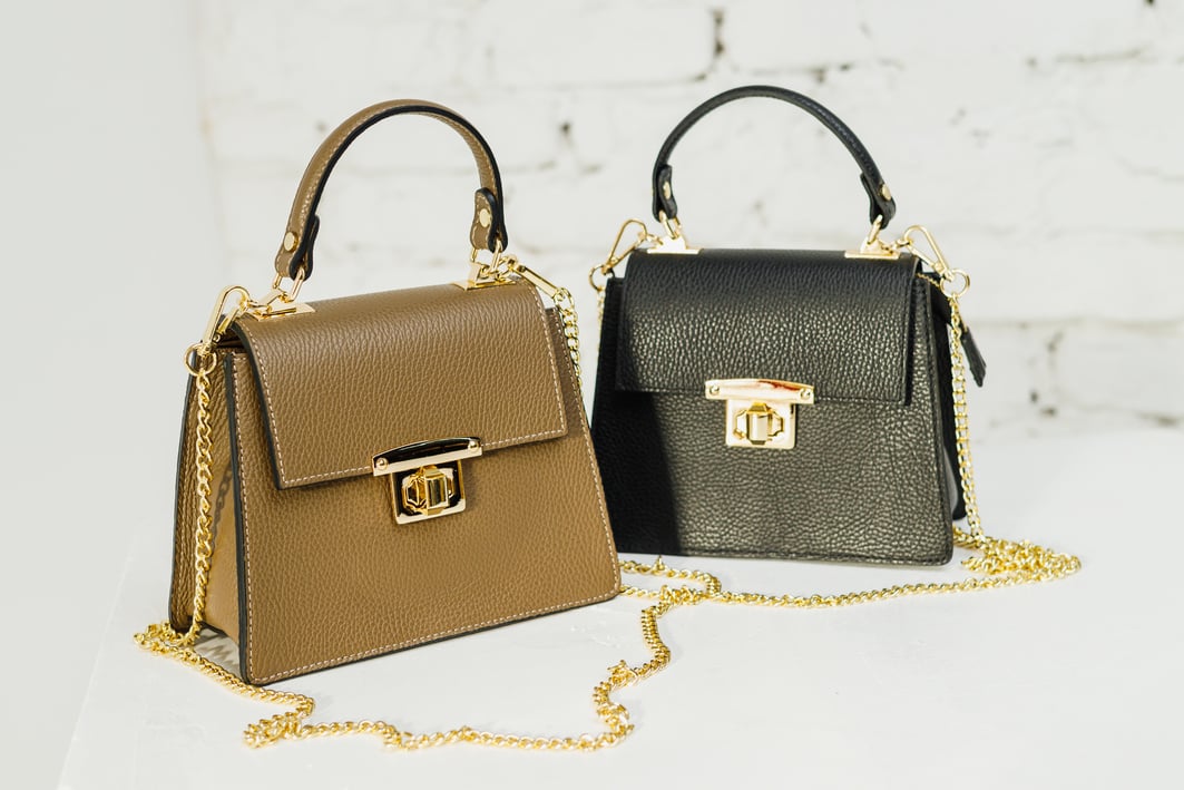 Women's leather cocktail bags on metal chains. Fashionable small women's bags